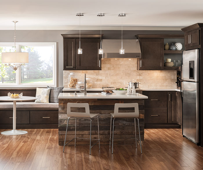 kitchen with dark wooden cabinets and flooring