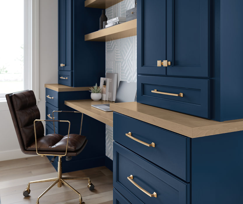 home office with dark blue cabinetry