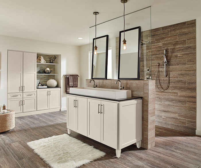 light brown tile in bathroom with ivory white cabinetry