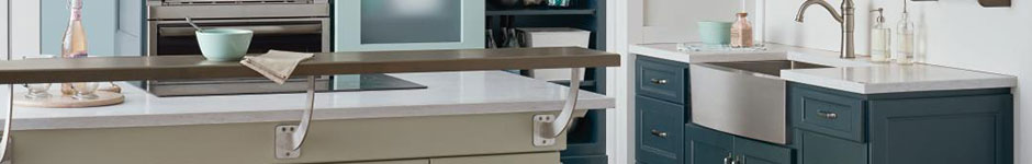 Neutral kitchen with blue cabinets